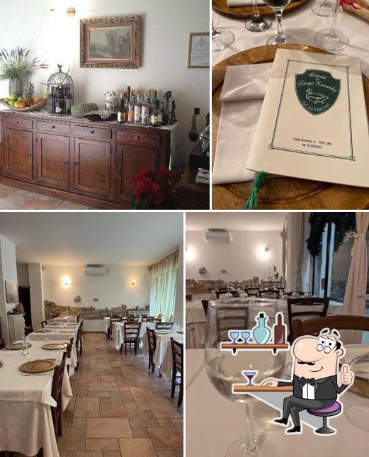 La foto di interni e bevanda da Osteria di Largo Kennedy