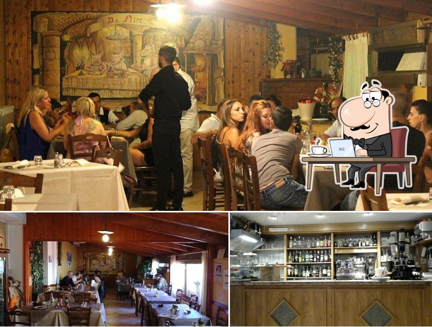 Guarda la foto che presenta la interni e bancone da bar di Ristorante Pizzeria Nico'