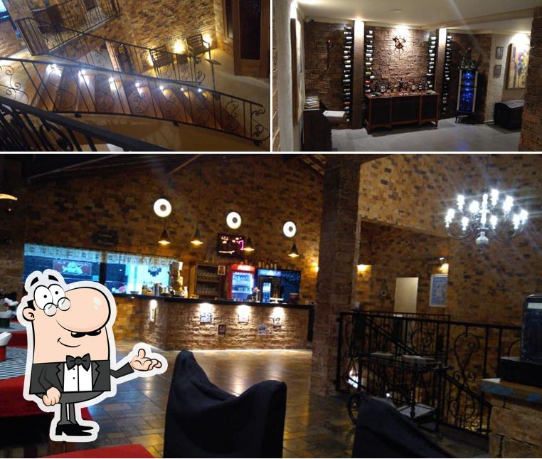 O interior do Dona Redonda Cantina & Pizzaria