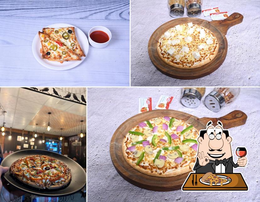 Try out pizza at The Black Panther Cafe