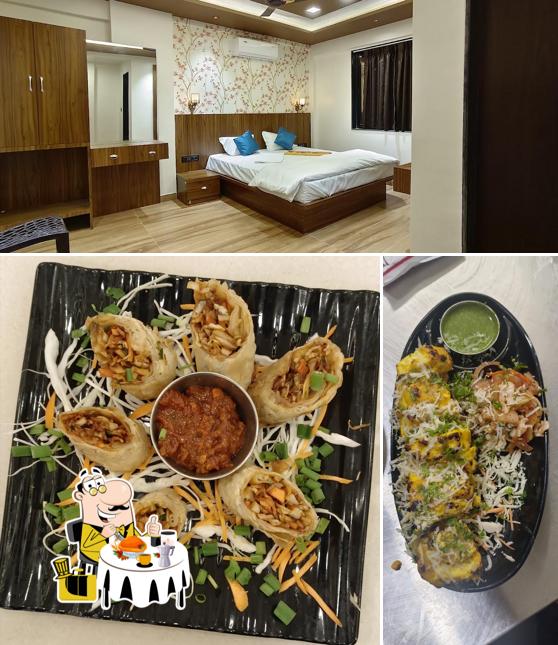 Among different things one can find food and interior at Hotel Raj Mudra & Lodging