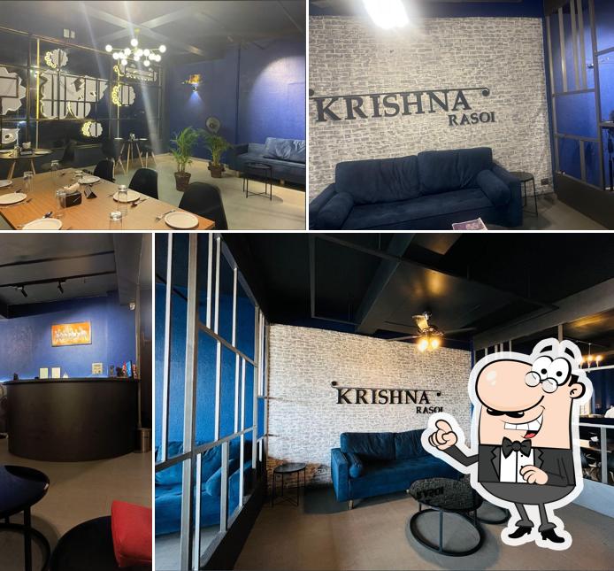 Take a seat at one of the tables at Hotel krishna Rasoi