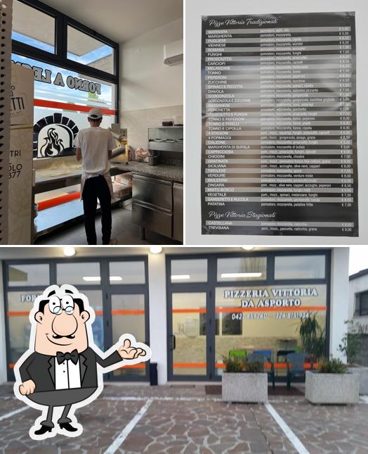 Questa è la foto che mostra la interni e esterno di Pizzeria Vittoria