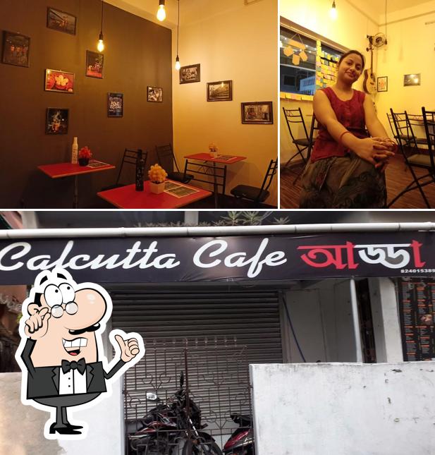 The photo of Calcutta Cafe Adda’s interior and exterior
