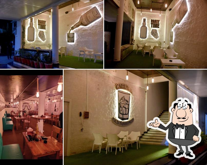 Take a seat at one of the tables at Modern Bar and Lounge