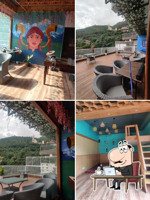 Take a seat at one of the tables at Triptin cafe & Resturant