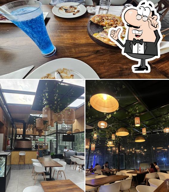 The picture of interior and food at Basil Bakehouse (Rooftop Restaurant & Cafe)