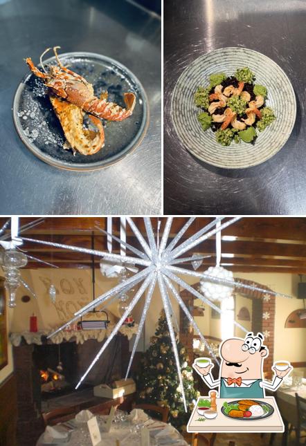 Questa è la immagine che presenta la cibo e tavolo da pranzo di Ristorante Casa Bianca
