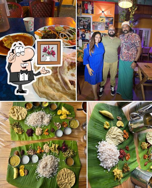 The interior of TUSKER CAF'E Restaurant Thekkady