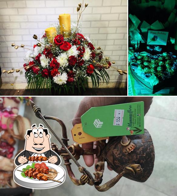 Check out the picture displaying food and interior at Mumma's flora