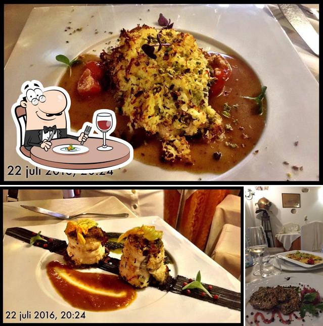 La foto della cibo e tavolo da pranzo di Pimm's