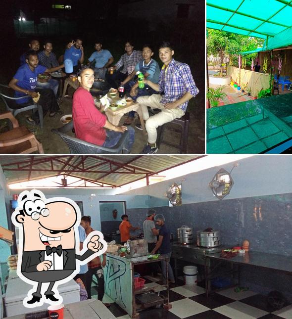 Take a seat at one of the tables at Annapoorna Chinese Fast Food