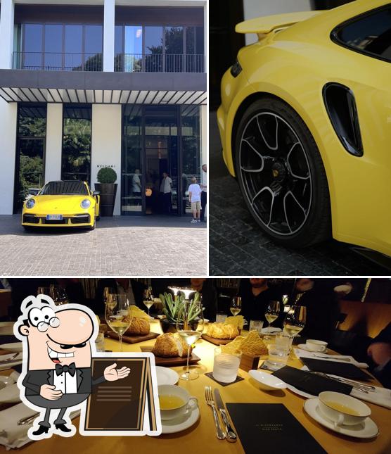 Tra le diverse cose da Il Ristorante - Niko Romito si possono trovare la esterno e tavolo da pranzo