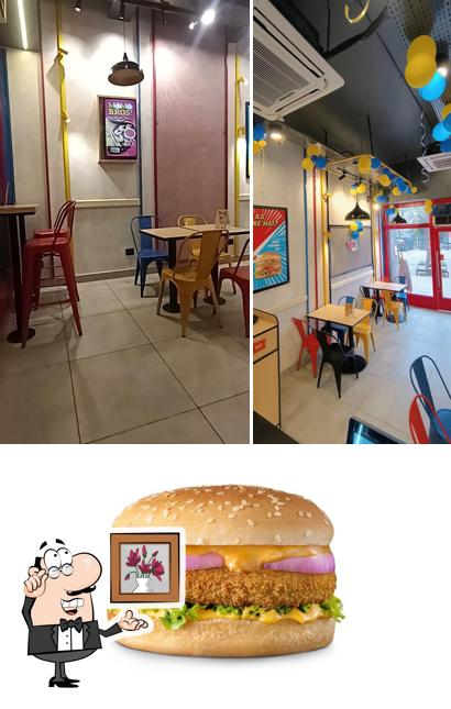 This is the image showing interior and food at Burger Singh