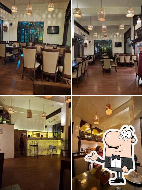 Take a seat at one of the tables at Ek Punjab Dhaba & Bar