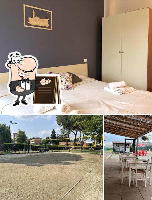 Questa è la immagine che raffigura la esterno e cibo di Sportland la badia