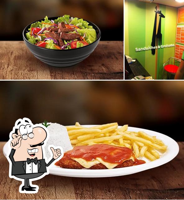 A ilustração do Giraffas Hiper Carrefour Sul’s interior e comida