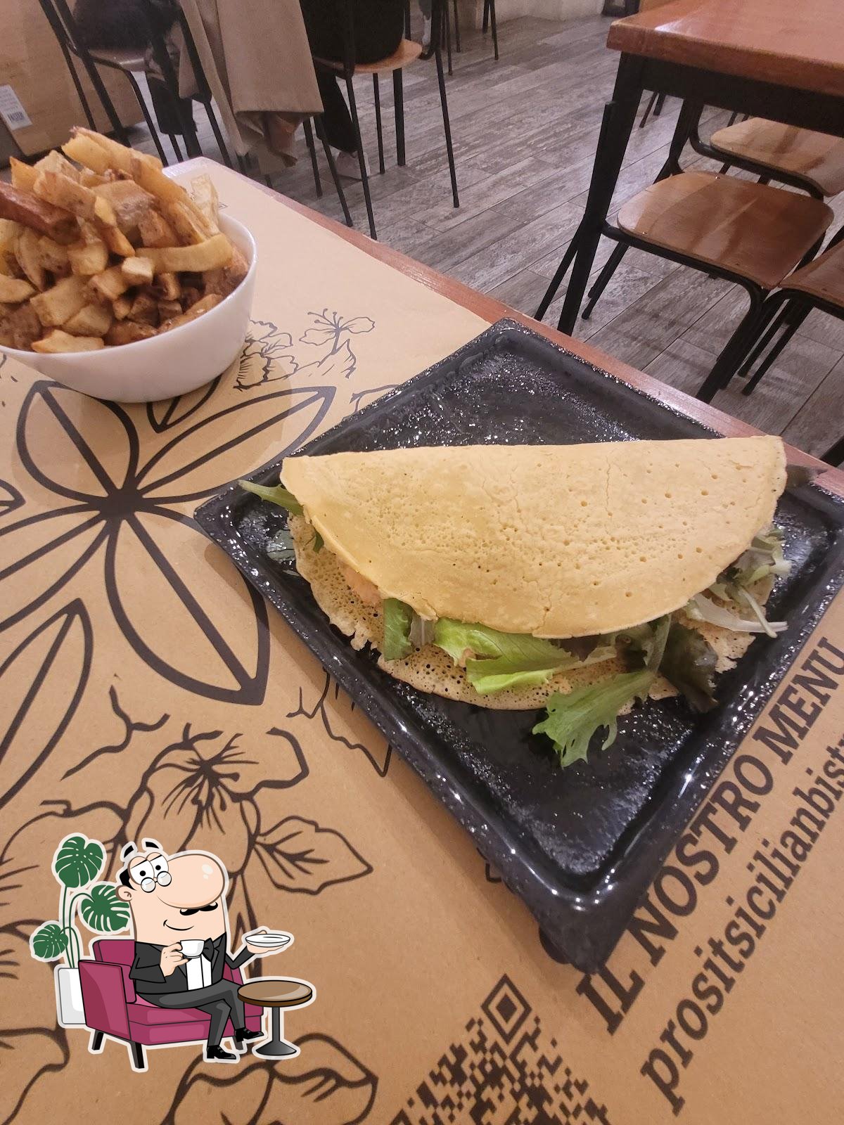 Siediti a un tavolo di Prosit Sicilian Bistrot.