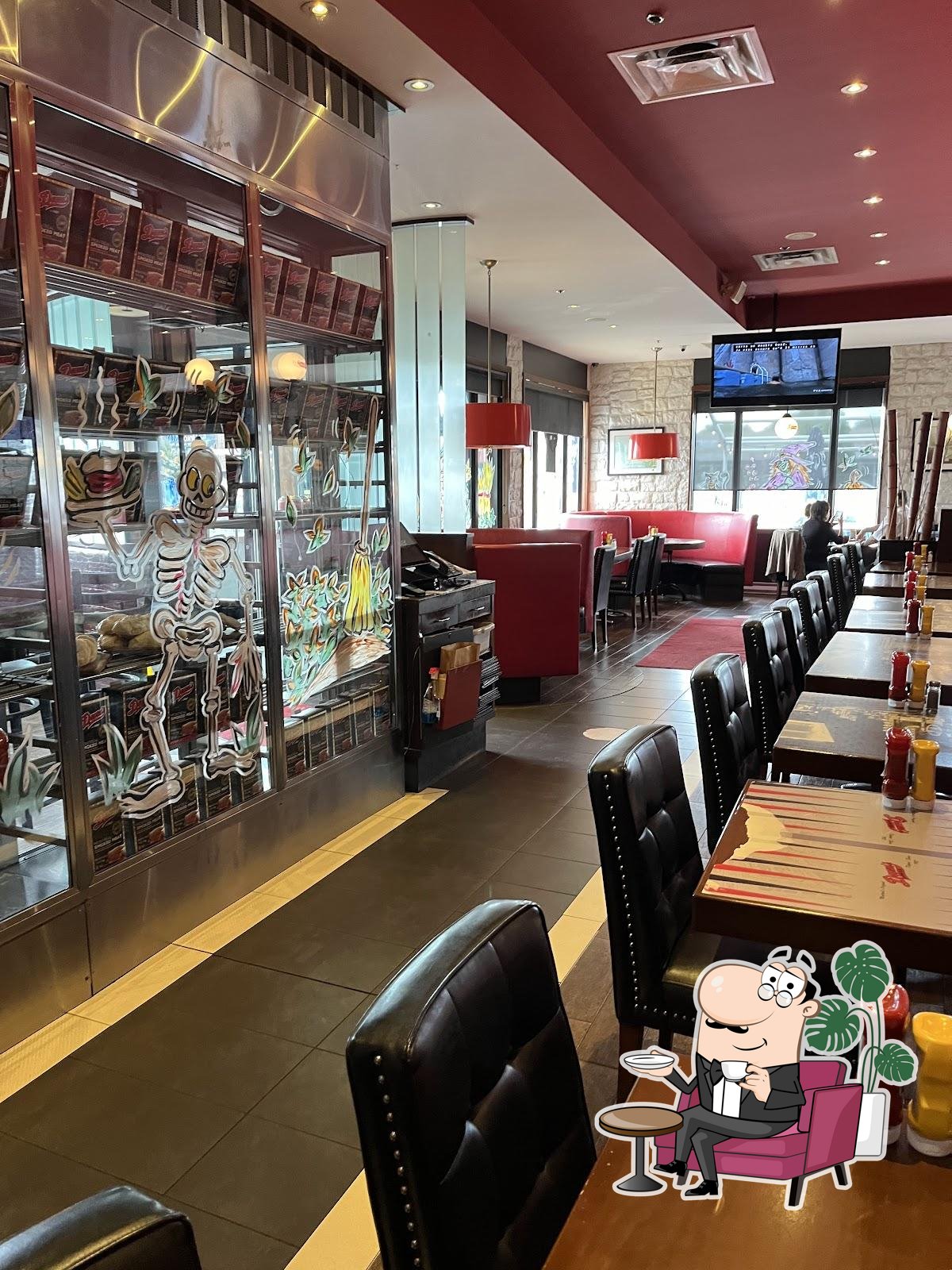 Take a seat at one of the tables at Dunn's Famous.