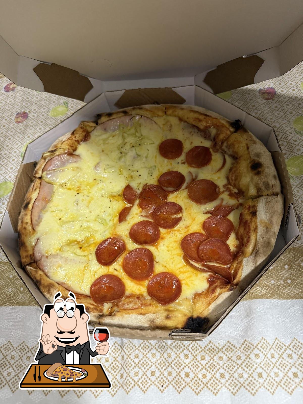 No Pizzaria Família Duarte - Higienópolis, você pode provar pizza.