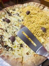 Tradicional Pizzaria