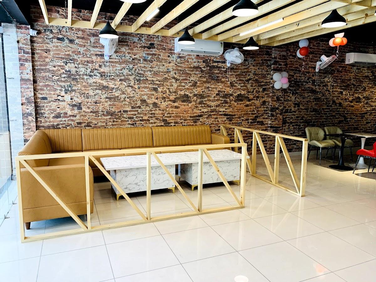 The Taste of Bistro Best Delicious Restaurant in Mahilpur Pizza Burgers Wraps Coffee Home Delivery