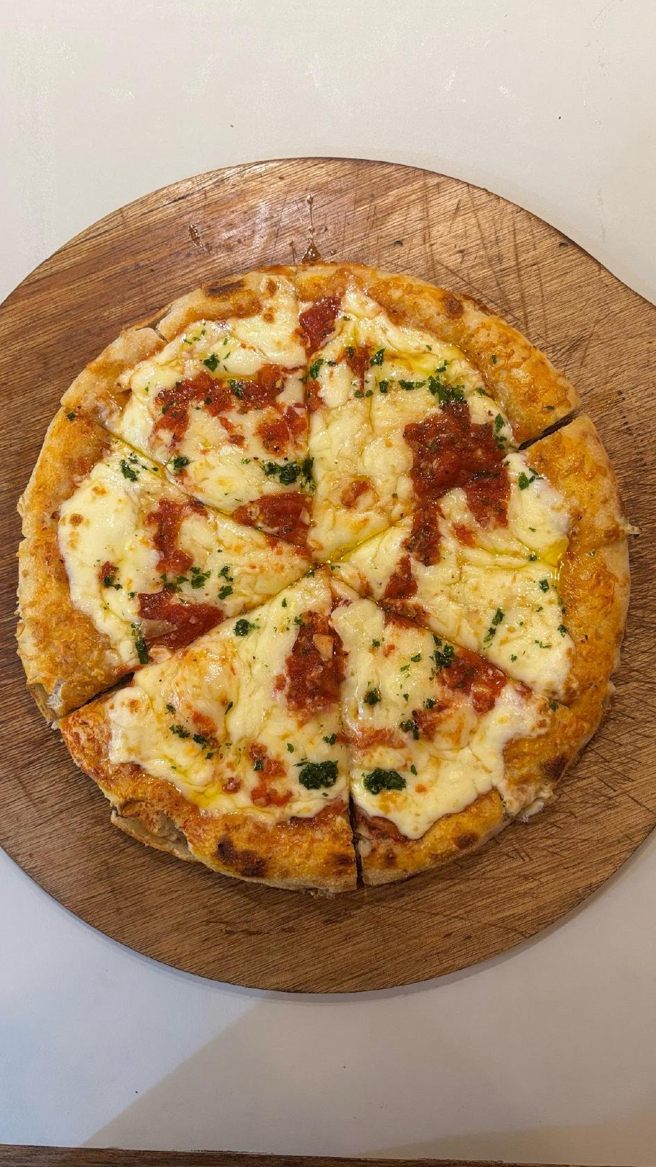 Santa Maradó Pizza Porteña