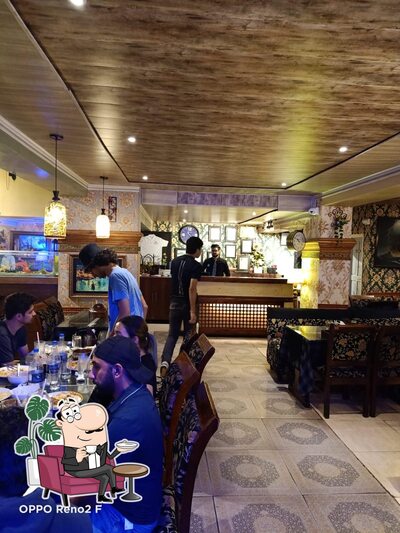 Check out how Stream Restaurant Best Restaurant On Dal Lake INDIAN AND AUTHENTIC KASHMIRI WAZWAN looks inside