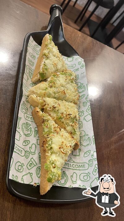 Take a seat at one of the tables at The Daily Toast