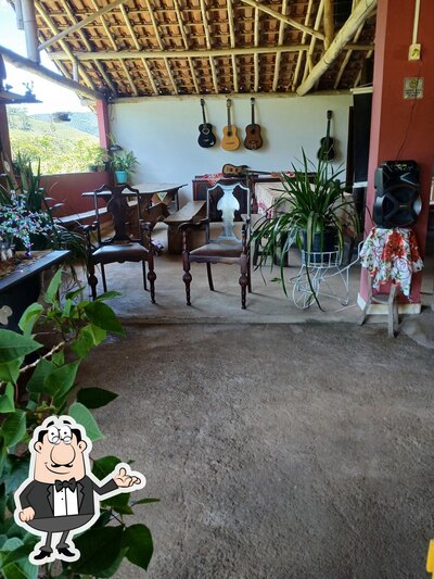 Sente em uma das mesas no Pesqueiro Do Tarcisio