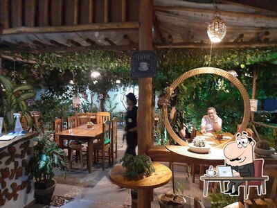 O interior do Delícias E Café