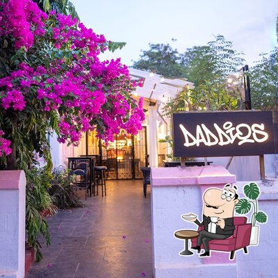 Take a seat at one of the tables at Daddios
