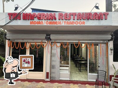 Take a seat at one of the tables at THE IMPERIAL RESTAURANT