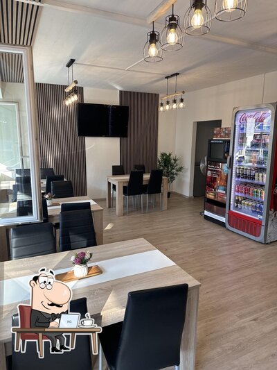 Dai un'occhiata agli interni di Flums Pizza Kebab