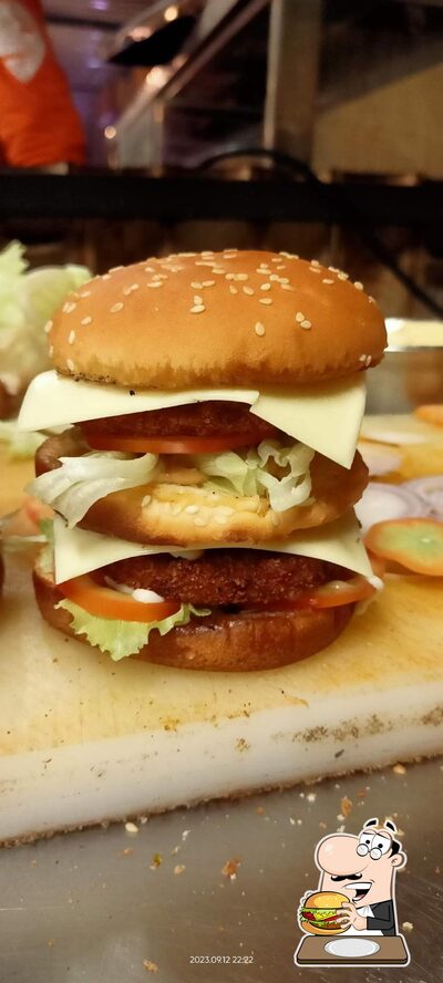 Treat yourself to a burger at Pesto Resto Cafe