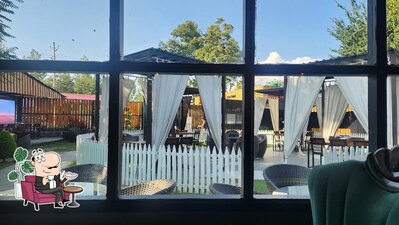 The interior of Stream Restaurant Best Restaurant On Dal Lake INDIAN AND AUTHENTIC KASHMIRI WAZWAN