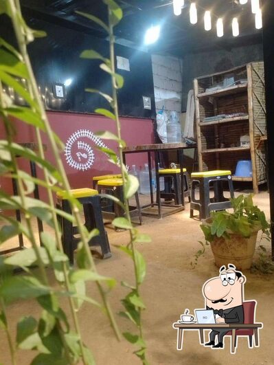 Take a seat at one of the tables at Thendral Fast Food