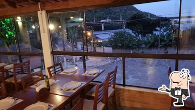 Veja imagens do interior do Pizzaria Bananalle