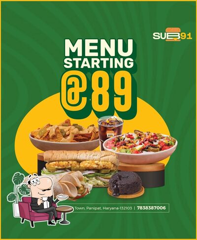 Take a seat at one of the tables at SUB91 Model Town Panipat
