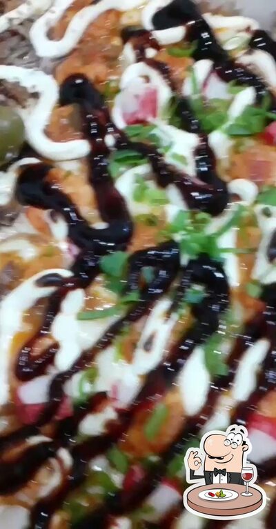 Comida em Pizzaria e Restaurante Chesmar