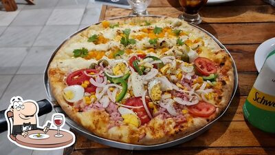 Comida em Pizzaria Arretada