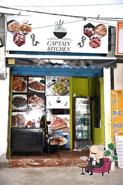 Take a seat at one of the tables at Captain Kitchen