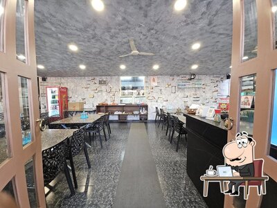Take a seat at one of the tables at Women's Kitchen Family Restaurant