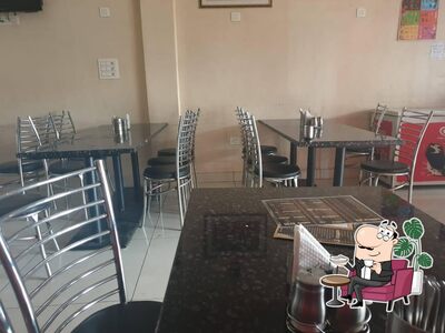 Take a seat at one of the tables at Barbeque Junction