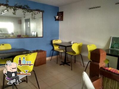 Take a seat at one of the tables at Coffee Stop