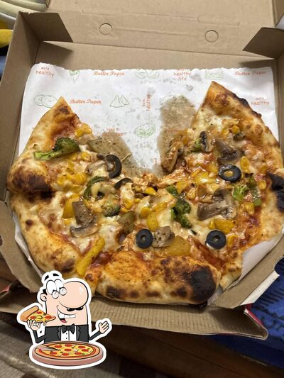 Try out pizza at Curry Castle