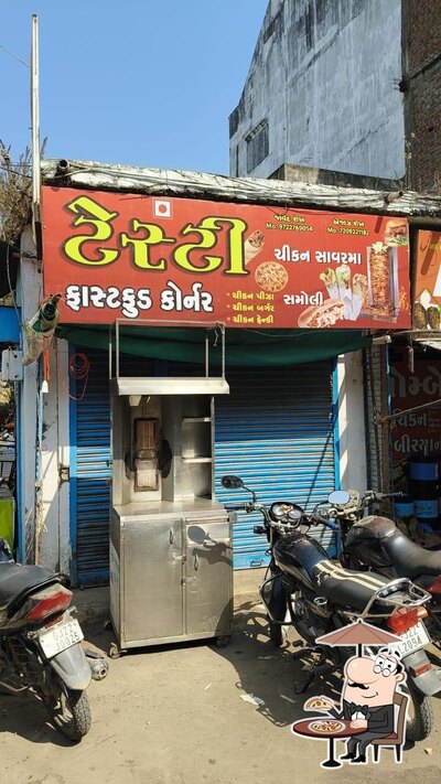 Enjoy the view outside Testy Chikan fast Food and sawrma
