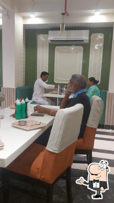 Take a seat at one of the tables at Saffron&Spice