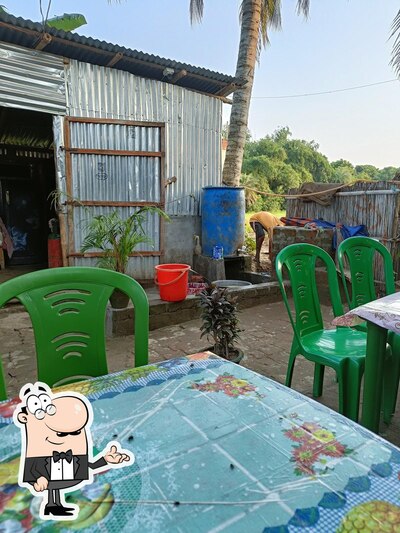 Take a seat at one of the tables at Adda