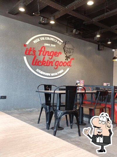 Take a seat at one of the tables at KFC
